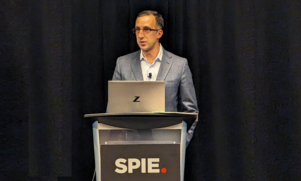 Speaker Brian Perrault of Needham & Co. at the SPIE Global Business Forum