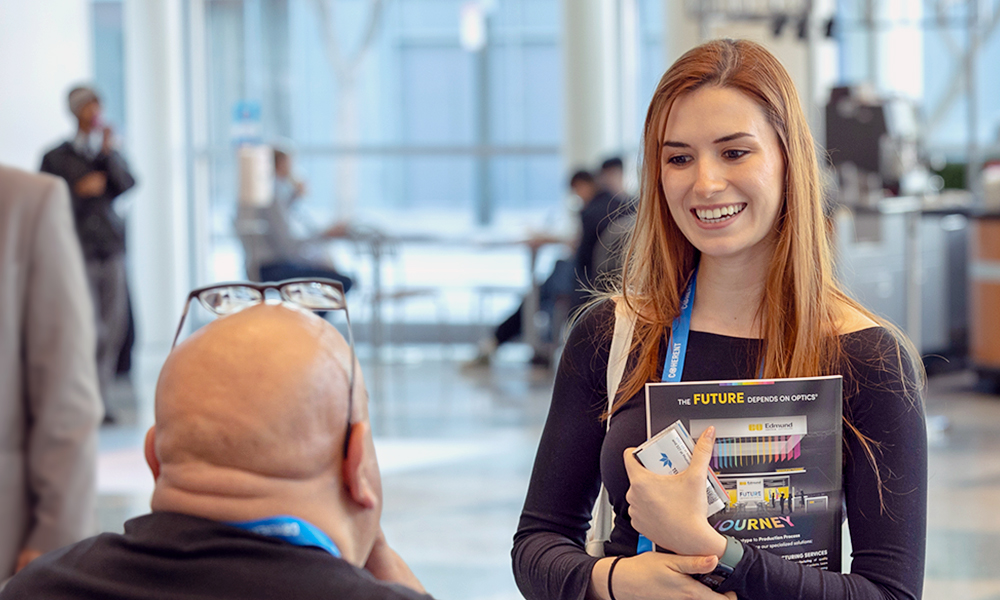 Employer meets potential employee at the Photonics West Job Fair