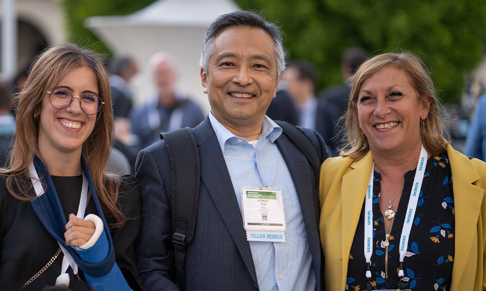 Three SPIE Members at a welcome reception