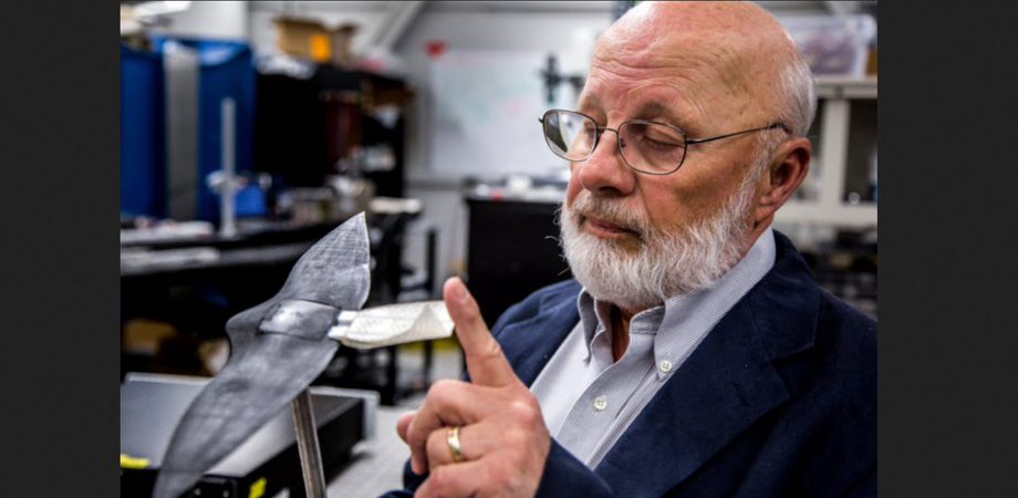 In the AIMS Lab at the University of Michigan, Daniel Inman inspects a model from a 2016 project studying how birds use their tails for stability.