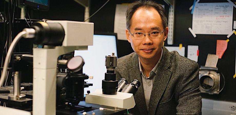 Wei Min at work in his lab.