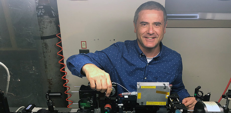 Zeev Zalevsky in his lab, working with a setup doing super resolved imaging in silicon.