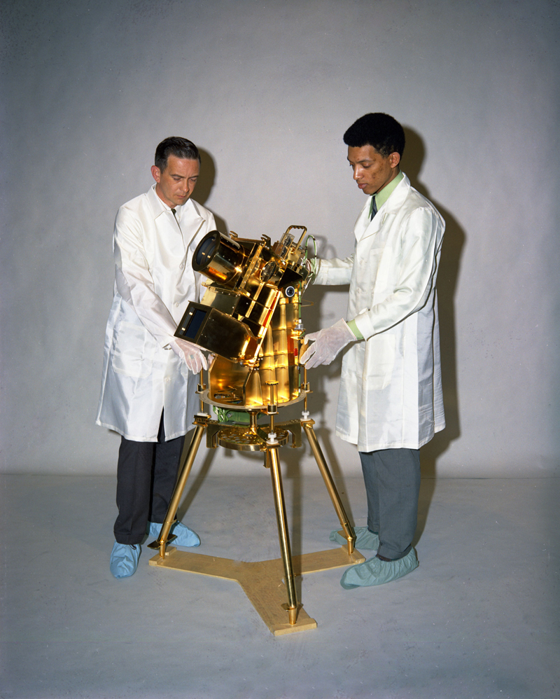 George Carruthers and William Conway examine the lunar surface far-ultraviolet camera/spectrograph