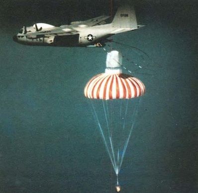 A newly released photo of a US military aircraft retrieving a film capsule under parachute